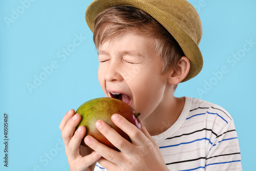 Cute little boy eating fres...