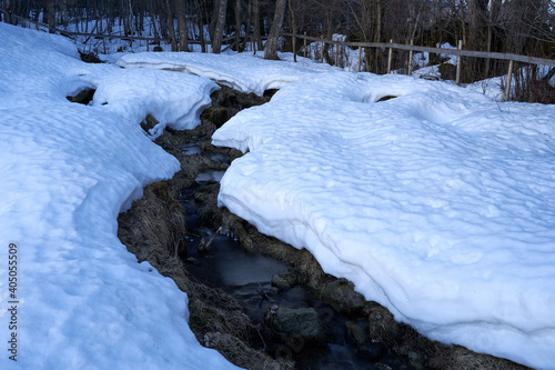 Fotótapéta Holmstadbekken brook in winter, Toten, Norway.