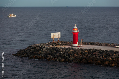 The lighthouse on North Mole at the entrance to Fremantle Harbor, Western Australia. © Philip Schubert