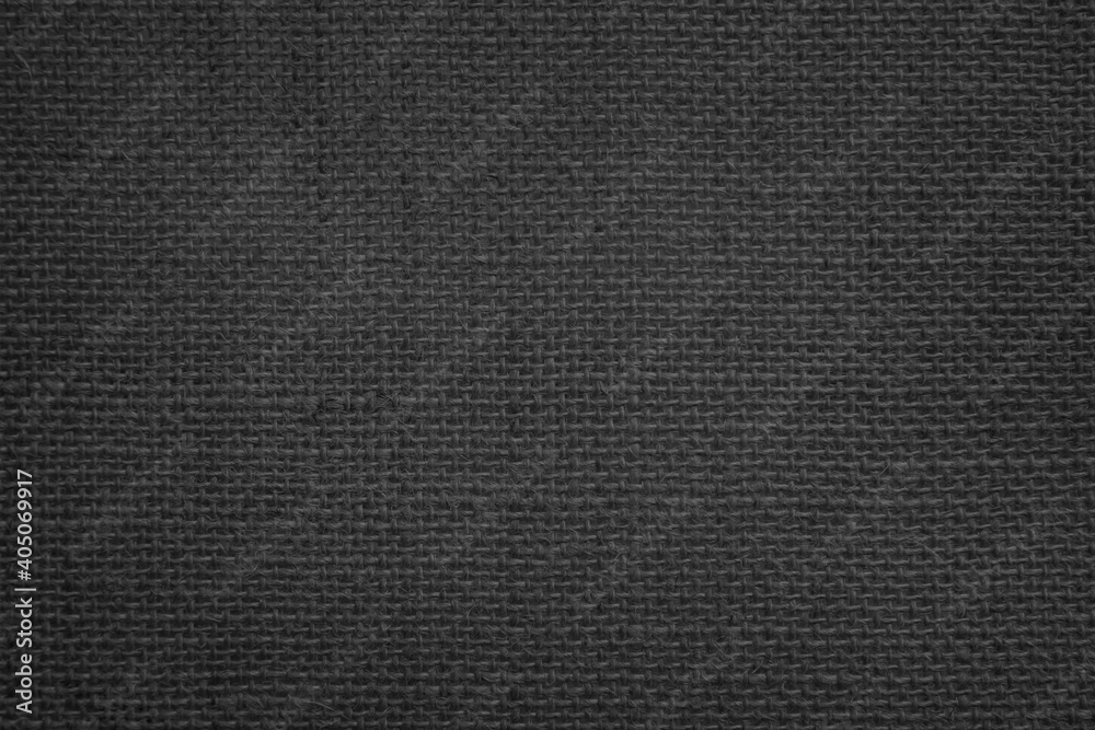 Jute hessian sackcloth canvas woven texture pattern background in light black color blank empty. Jute hessian sackcloth canvas woven texture pattern background in light black color blank empty.