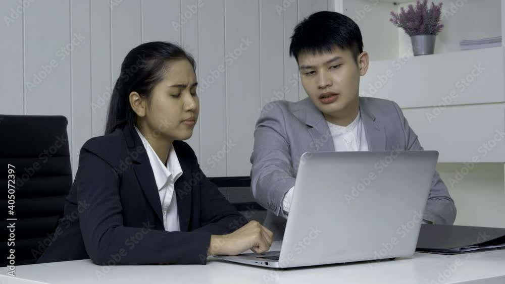 Businessman and partner talking about business plan at office. They using laptop to work. Businessman and partner talking about business plan at office. They using laptop to work.