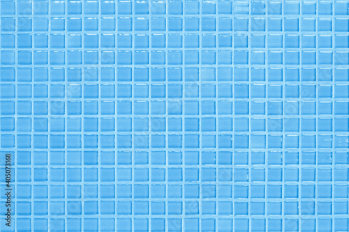 Blue pastel ceramic wall and floor tiles abstract background. Design geometric mosaic texture decoration of the bedroom. Simple seamless pattern for backdrop advertising banner poster or web.