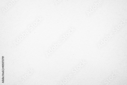 White recycled craft paper texture as background. Grey paper texture cardboard. 