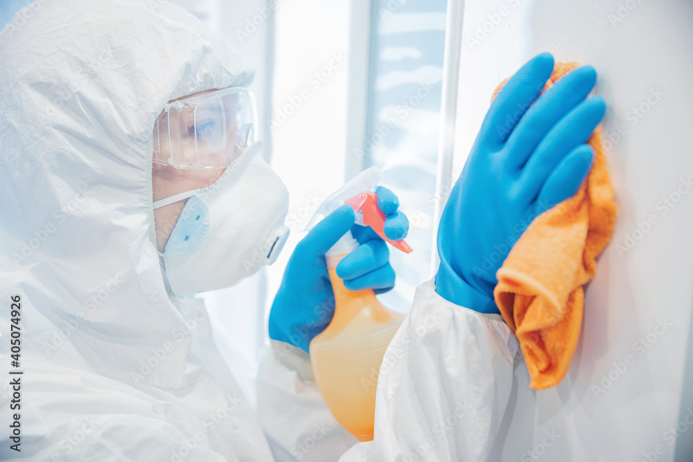 Fototapeta premium Medical staff cleaning and disinfection with antiseptics of viruses and germs, cleaner service against coronavirus