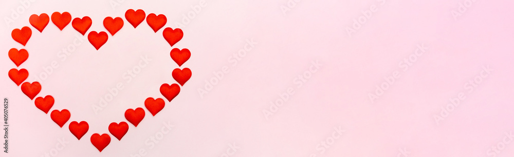 Banner big heart of small hearts mock-up on a pink background. Concept of holidays and Valentines Day