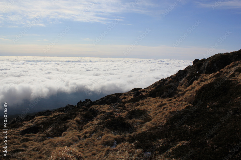 clouds at the top of a mountain