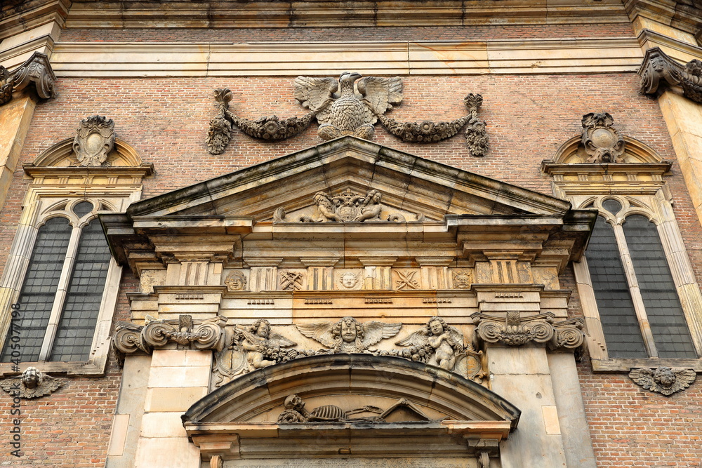 Details of the carvings above the main entrance to the octagonal shaped Oostkerk church in Middelburg, Zeeland, Netherlands