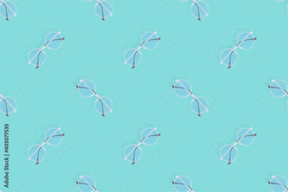 Glasses seamless pattern. Glasses for improving vision on an aquamarine background.