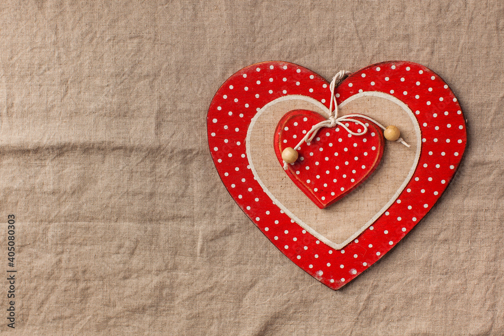 Flatlay heart on a linen tablecloth. Valentine's Day background. Copy space. Flatlay heart on a linen tablecloth. Valentine's Day background. Copy space.