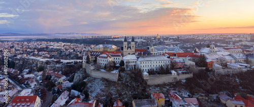 Foto Veszprém, Hungary - Amazing aerial view of Veszprém downtown and castle district on a winter morning with stunning golden sunrise