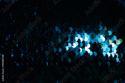Fototapeta Naklejka Na Ścianę i Meble -  dark background with light sparkles, short focus