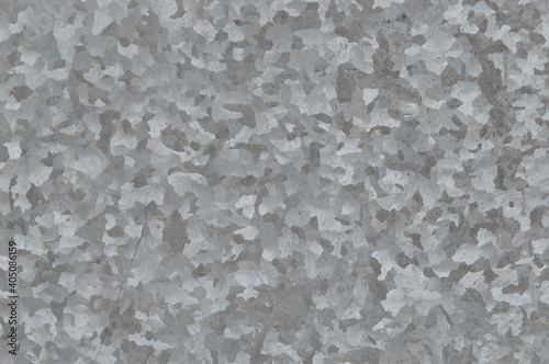 metal grunge background: sheet of rolled metal with scratches and stains, dirt. Toning, close