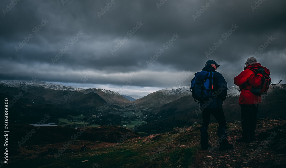 Two Hikers Enjoying the Lake District views. 