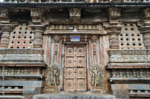 Ancient stone carved door of temple in Belur, India.