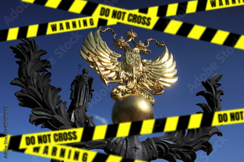 The coat of arms of Russia is a Double-Headed Eagle behind protective yellow and black ribbons with the inscriptions DO NOT CROSS  WARNING. Foreign policy concept of Western influence