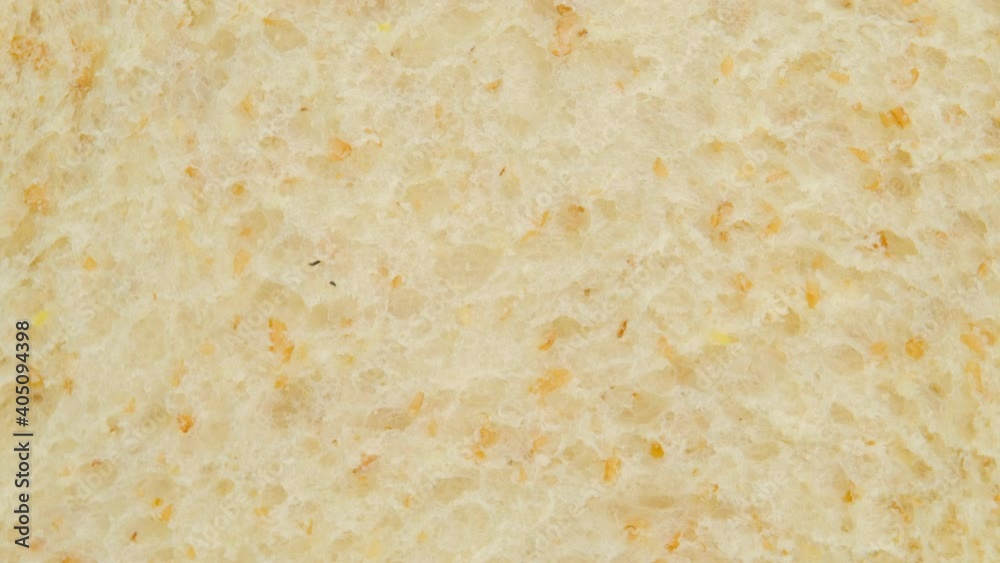 Macro shot of Whole wheat bread slice rotation, Close up. Macro shot of Whole wheat bread slice rotation, Close up.