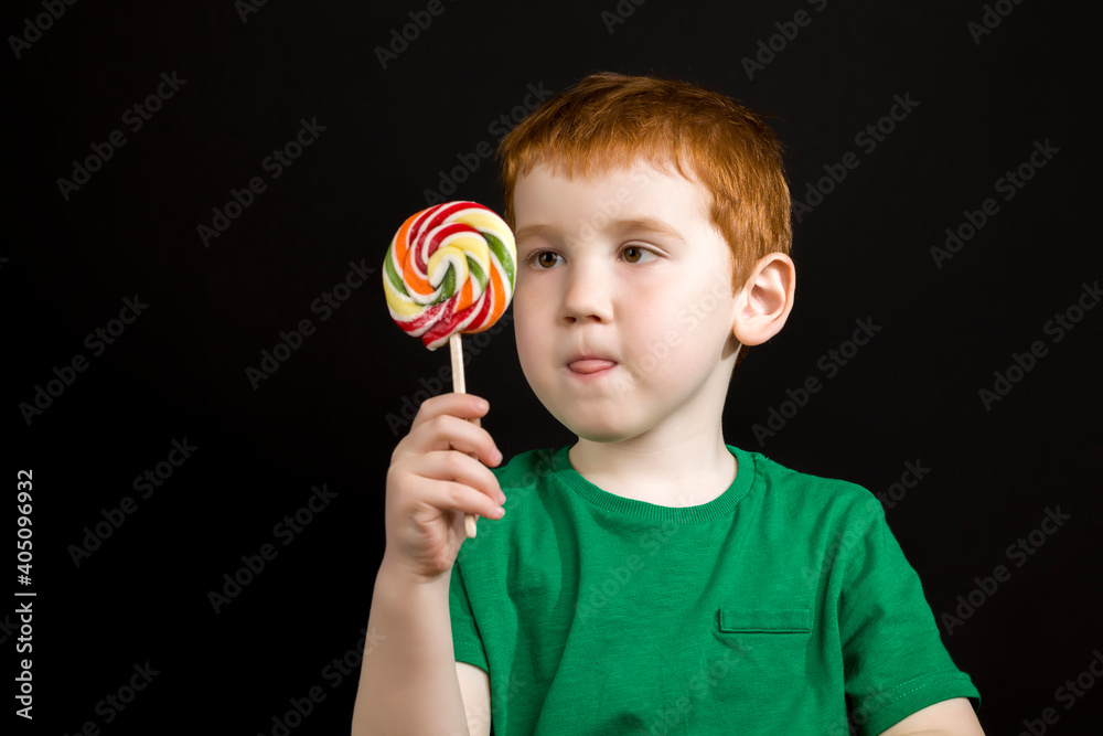 a red-haired boy with a Lollipop