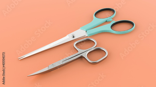 Two scissors on a peach background