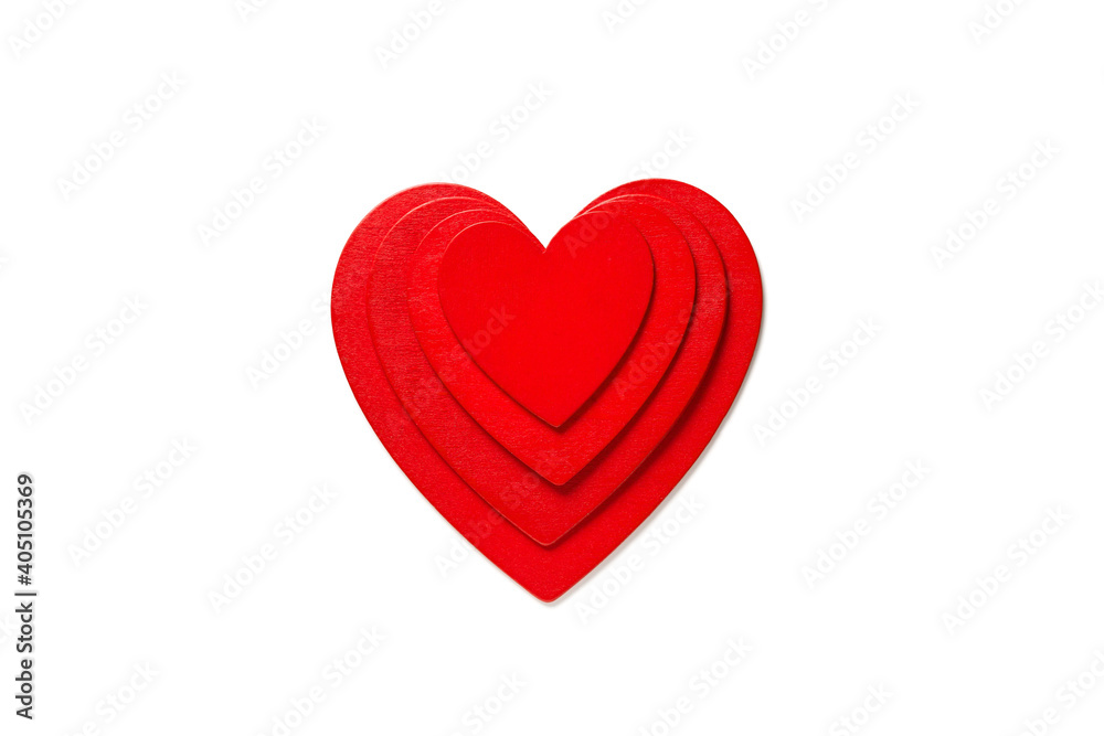 Love symbol decoration, concept of Valentine day, red painted hearts lying in a stack on white