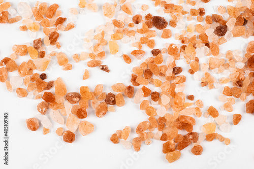 Pink himalayan salt on a white background with visible details