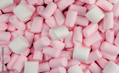 A bunch of pink and white marshmallows.