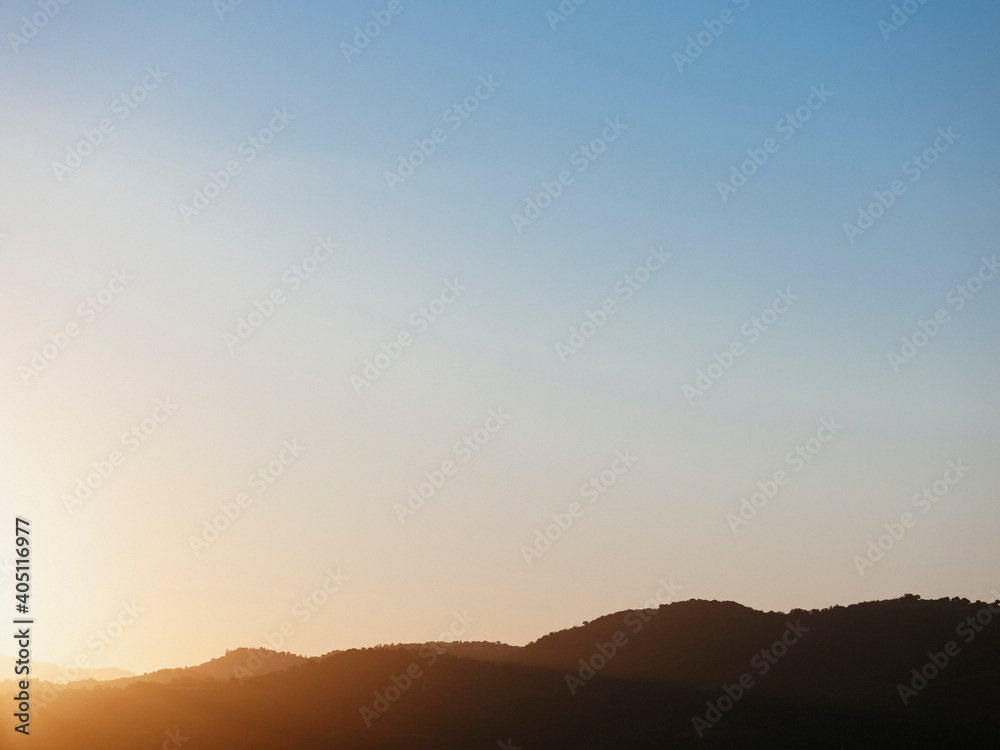 Tranquil blue sunset sky over silhouetted hills, Tanneron, French Riviera, France
Tranquil blue sunset sky over silhouetted hills, Tanneron, French Riviera, France