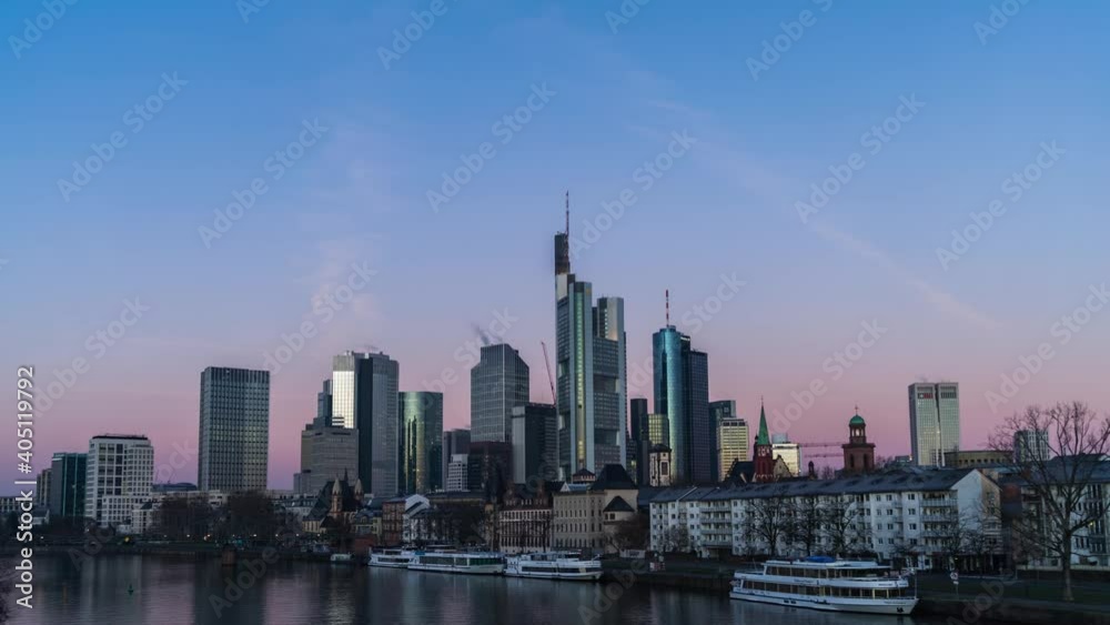 Light shining Frankfurt skyline, sunrise over financial district near the Main