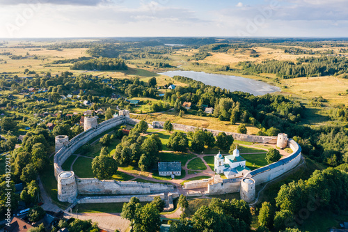 Aerial view of Izborsk Fortress at sunset. Travel sight in Pskov Oblast, Russia photo