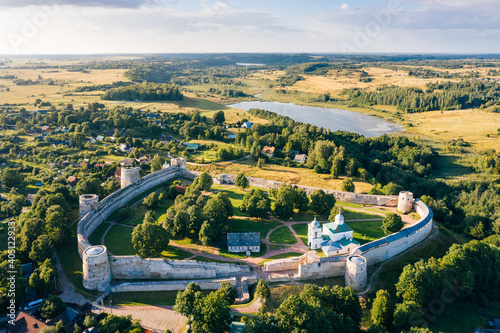 Cuadro en lienzo Aerial view of Izborsk Fortress at sunset