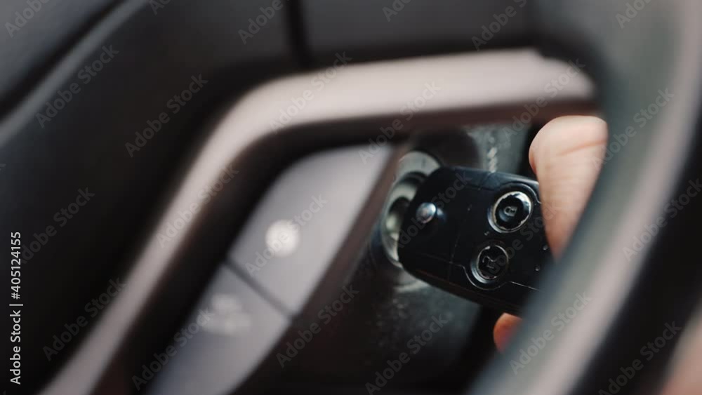 The ignition key is inserted into the well and start the car engine