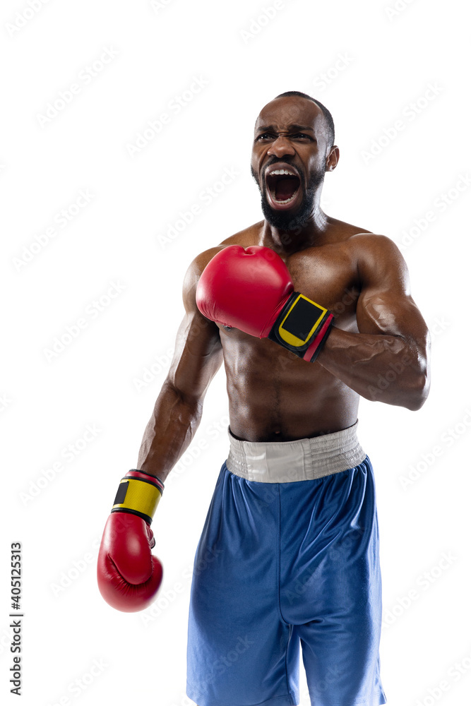 Screaming. Funny, bright emotions of professional african-american boxer isolated on white studio background. Excitement in game, human emotions, facial expression and passion with sport concept.