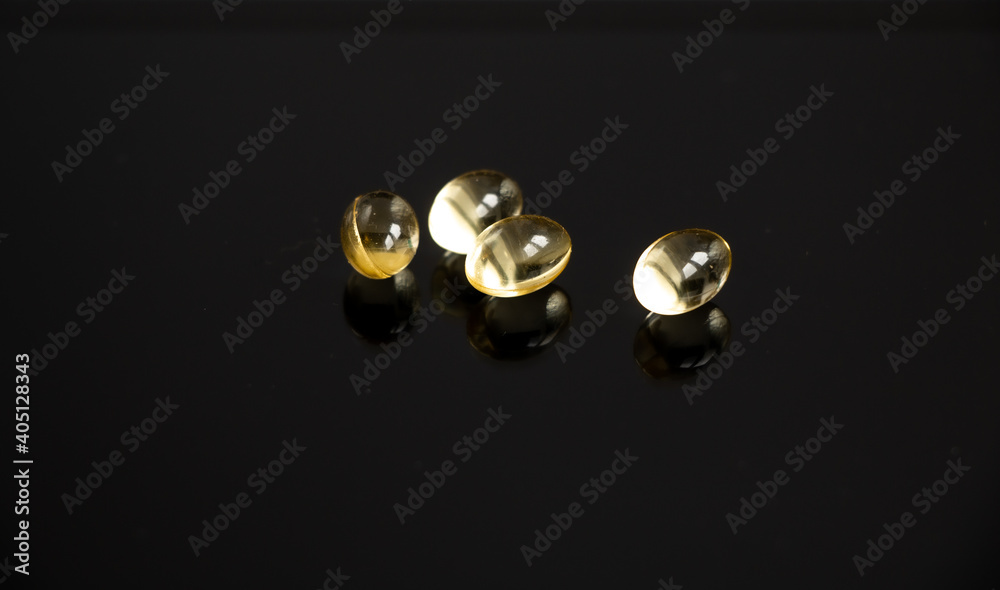vitamins D3 for beauty on the black background vitamins D3 for beauty on the black background