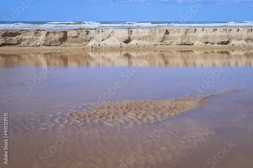 puddles in the sand after sea tide