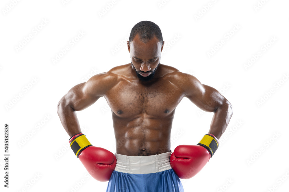 Concentrated. Funny, bright emotions of professional african-american boxer isolated on white studio background. Excitement in game, human emotions, facial expression and passion with sport concept.
