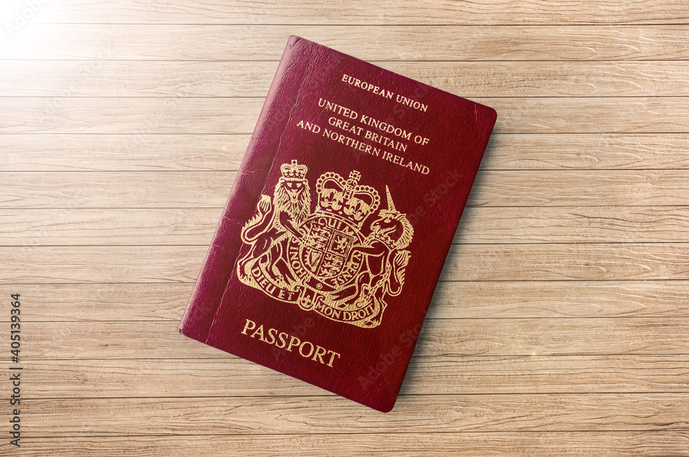 United Kingdom Passport on Wood Lines Background Banner with Copy Space United Kingdom Passport on Wood Lines Background Banner with Copy Space
