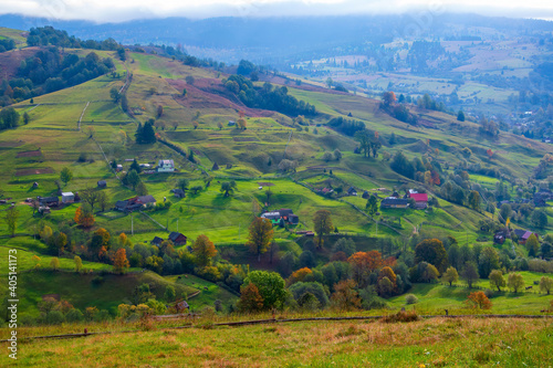 Scenic view of hills illuminated by autumnal sun in mountain village, Carpathian mountains, Lazeschyna, Ukraine