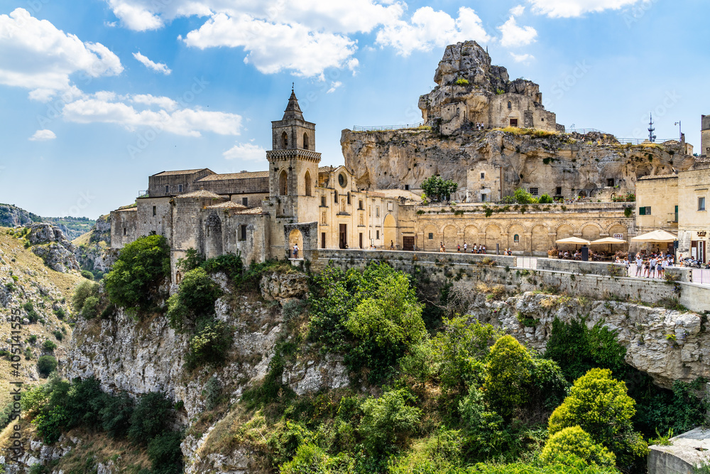 Two of Matera most famous landmarks: the church of San Pietro Caveoso and the ancient rock church of Santa Maria De Idris on the right, Basilicata, Italy