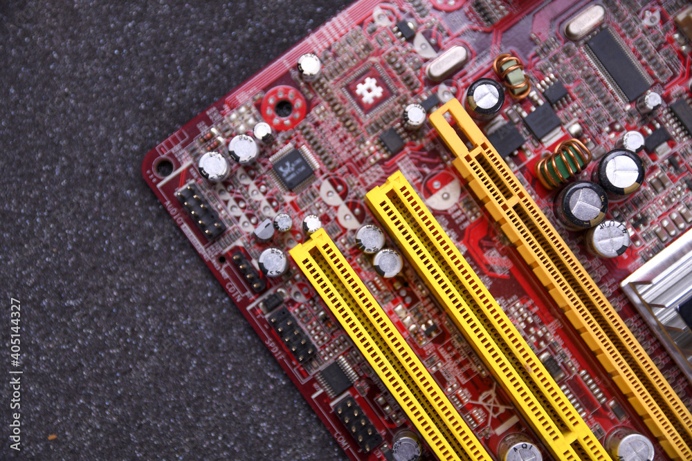 Computer motherboard and electronical components cpu gpu memory and different sockets for video card close up Computer motherboard and electronical components cpu gpu memory and different sockets for video card close up