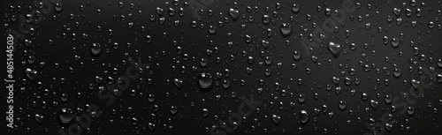 Foto Water droplets on black background