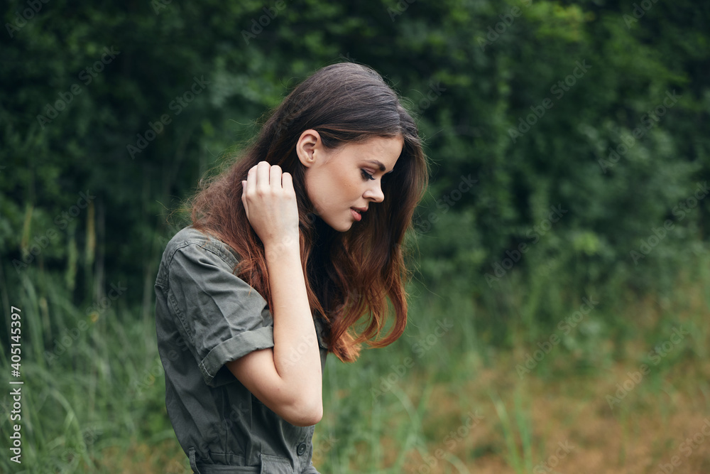 Woman in the forest Looks down a walk lifestyle fresh air Woman in the forest Looks down a walk lifestyle fresh air