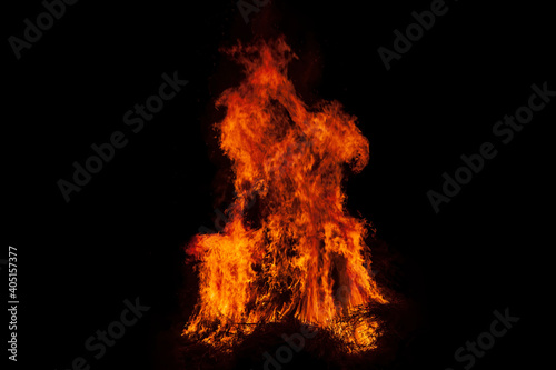 Fire flames on black background. Bonfire. Fire flame texture for background