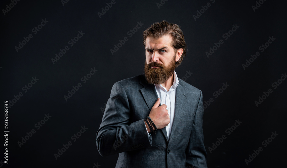 Man with beard wear grey suit corporate style, successful businessman concept Man with beard wear grey suit corporate style, successful businessman concept