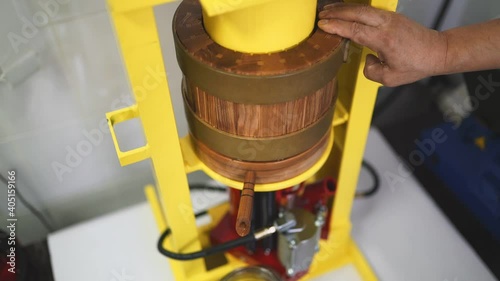 Press for cold pressing of oil with a wooden barrel