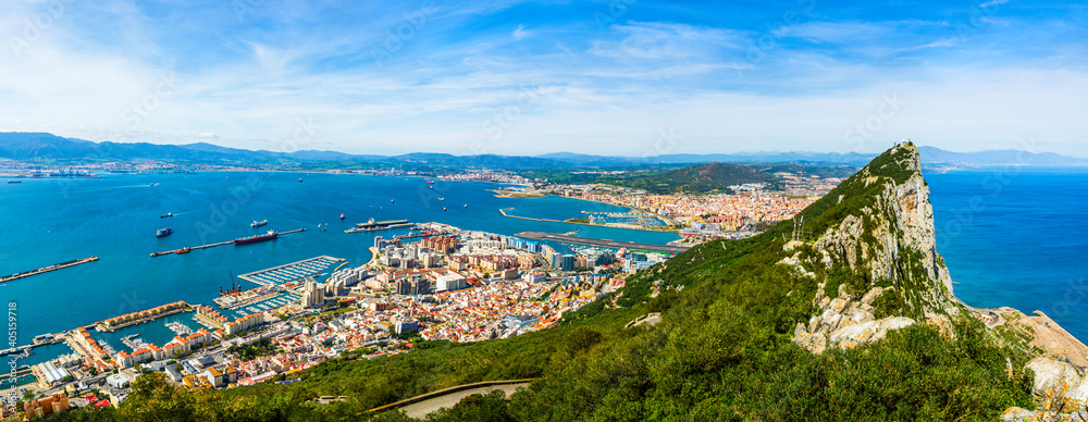 Colorful panoramic aerial view of the rock of Gibraltar, roof tops and the port of Gibraltar, Iberian peninsula, UK
