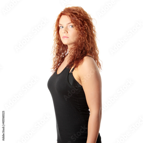 Portrait Of Beautiful Woman Standing Against White Background © piotr marcinski/EyeEm