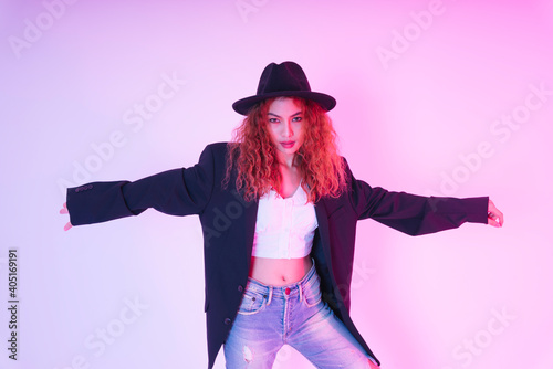 Fashion portrait of asian curly hair woman wear black jacket and hat isolate on white background.