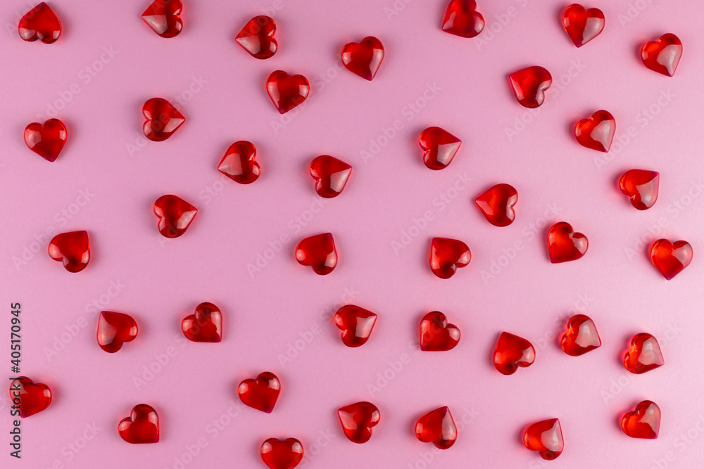 Valentine's day background of red hearts on pink backdrop. Holiday, father and mother day, background and postcard Valentine's day background of red hearts on pink backdrop. Holiday, father and mother day, background and postcard