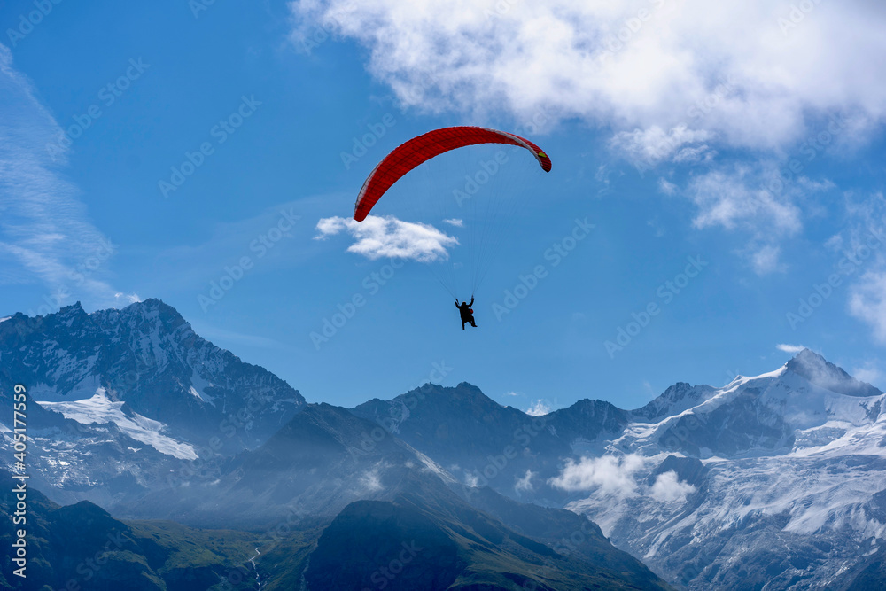 Tandem paragliding man with child at Zinal Sorebois. Tandem paragliding man with child at Zinal Sorebois.