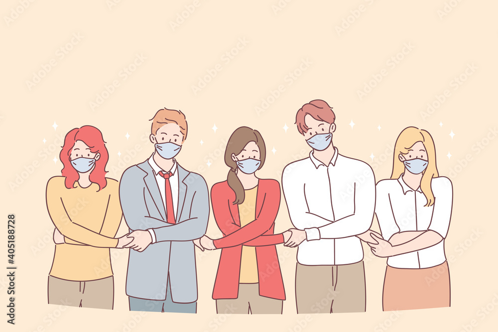 Teamwork, unity, protective masks during coronavirus pandemic concept. Young people business partners or creative colleagues standing and holding hands as symbol of uniting efforts and common goal Teamwork, unity, protective masks during coronavirus pandemic concept. Young people business partners or creative colleagues standing and holding hands as symbol of uniting efforts and common goal