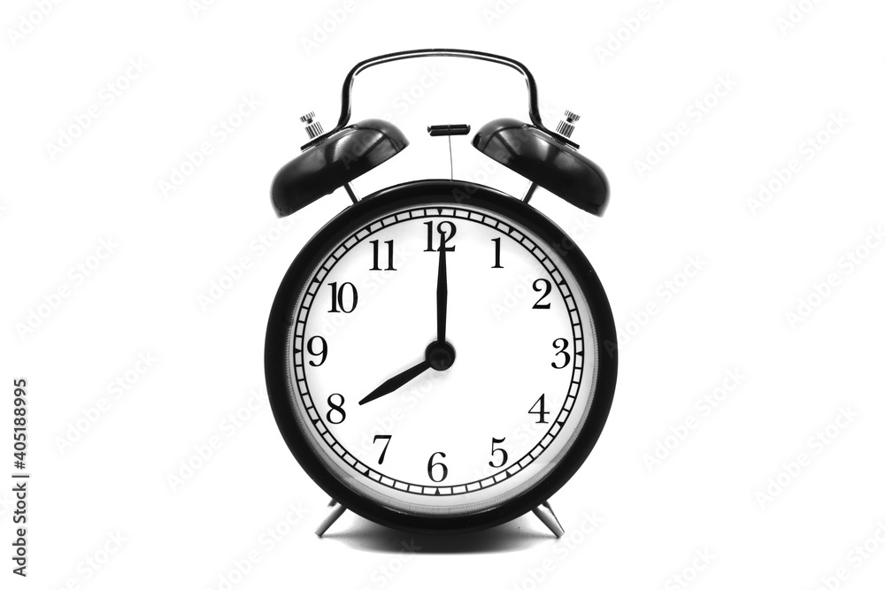eight o'clock old alarm clock isolated on white eight o'clock old alarm clock isolated on white